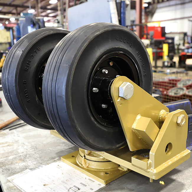 Inflated Benefits?  Comparing Pneumatic Wheels vs. Cushion Tread Wheels